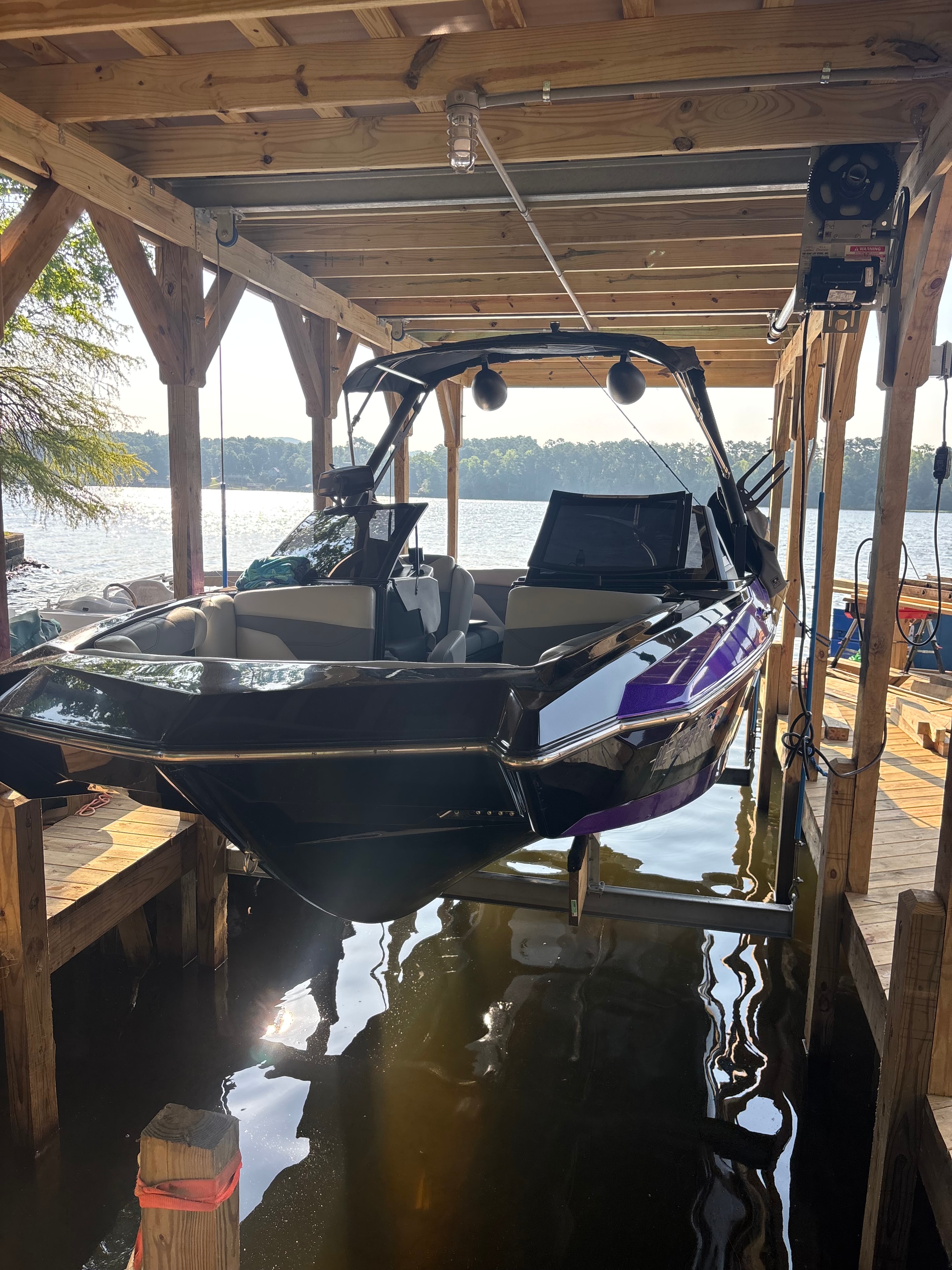 Doozie boat lift installed on a lake dock